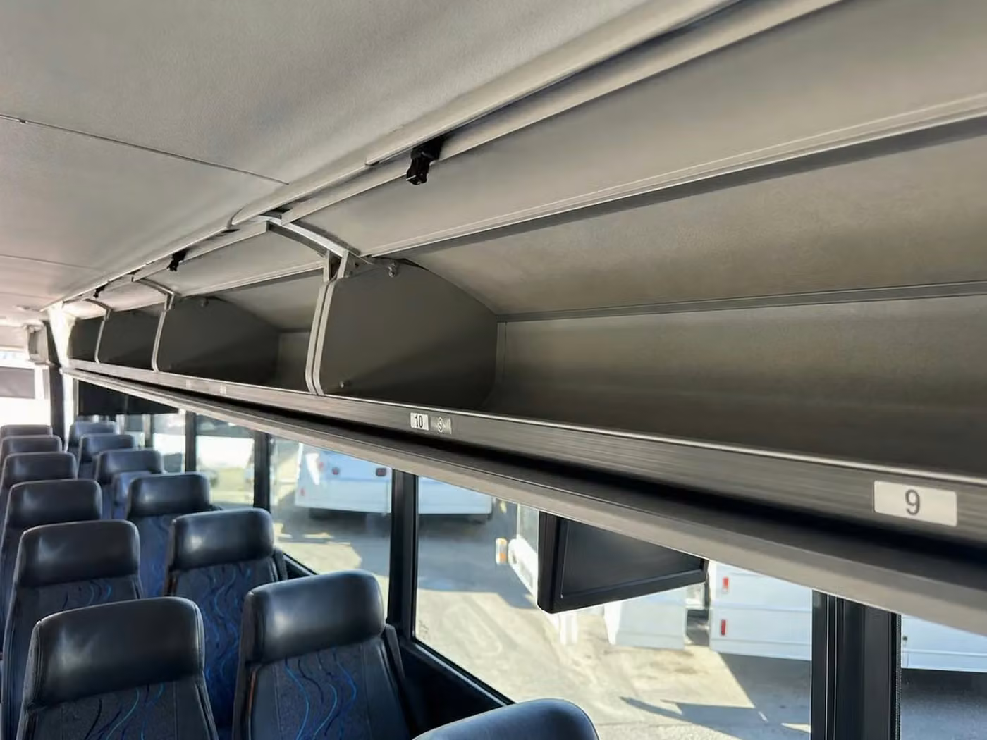 hobart 56 passenger charter bus overhead storage